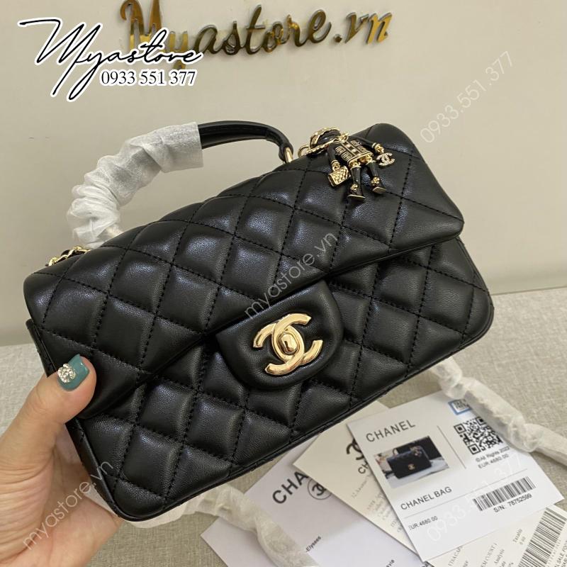 Túi xách Chanel siêu cấp màu đen charm trả khách