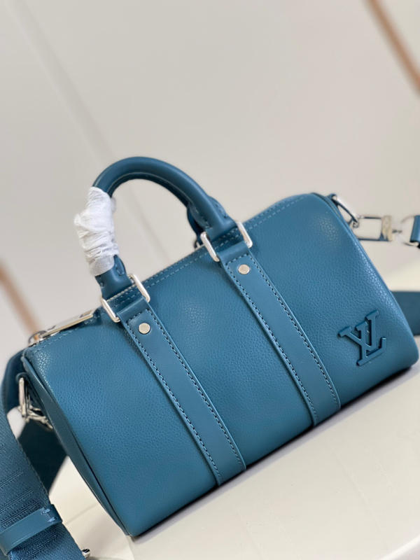 Túi xách nam nữ LV CITY KEEPALL Louis Vuitton siêu cấp 1:1 màu xanh ngọc